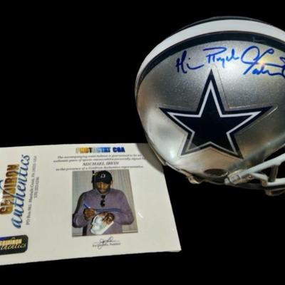 Michael Irvin Autographed Dallas Cowboys Mini Helmet
Dallas Cowboys | Black Framed Wall Mounted Mini Helmet Logo | Display Case