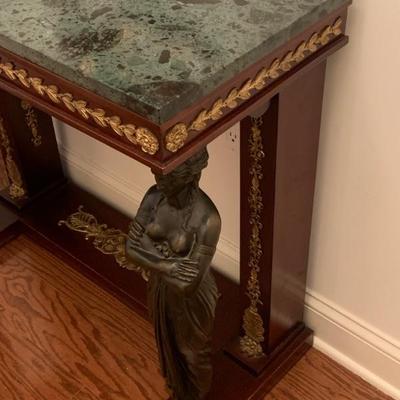 Marble top side table with bronze carved figures 