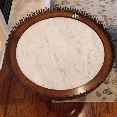 Antique marble top round table w/brass detail