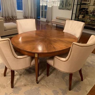 Baker Dining room table with 2 leaves & custom pads