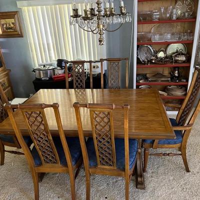 Vintage wooden dining table with 6 chairs blue fabric seats.  Plus two 