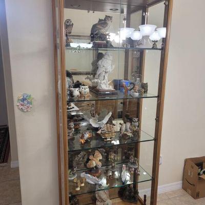 One of three curio cabinets, contents sold separately