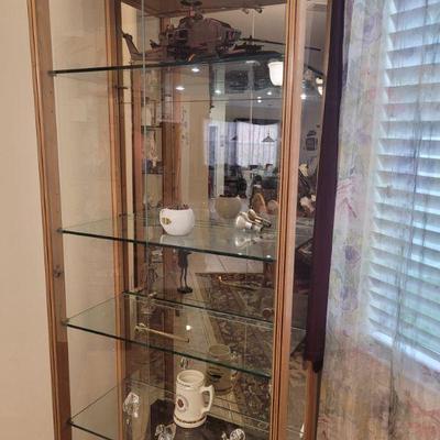 One of three curio cabinets, contents sold separately