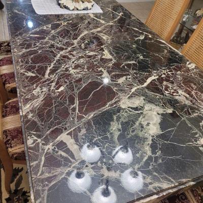Very large, marble top table and six chairs