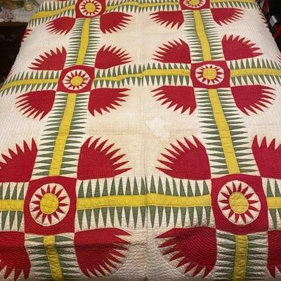 Brightly colored vintage quilt