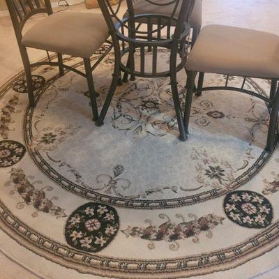 Round rug under the dining table