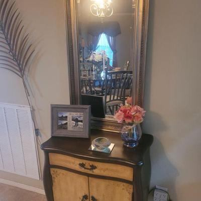 Another small cabinet with a drawer and two doors, mirror sold separately