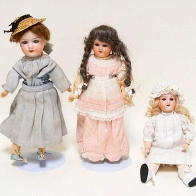 1054	3 ANTIQUE GERMAN BISQUE HEAD DOLLS, ARMAND MARSEILLES, TALLEST IS APPROXIMATELY 12 IN HIGH
