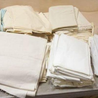 1300	LARGE LOT OF YARDAGE FOR QUILTS AND QUILT BACKING
