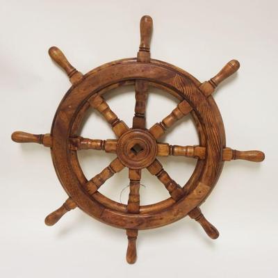 1075	WOOD ORNAMENTAL SHIPS CAPTAINS WHEEL, APPROXIMATELY 26 IN
