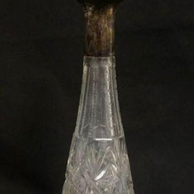 1016	CUT GLASS DECANTER W/800 SILVER BAND AT NECK, APPROXIMATELY 13 1/2 IN HIGH

