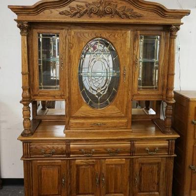 1178	CONTEMPORARY OAK SIDE BOARD WITH BEVELED PANELED GLASS DOORS, MIRROR BACK WITH INTERIOR LIGHTS HAVING CORINTHIAN COLUMNS AND CLAW...