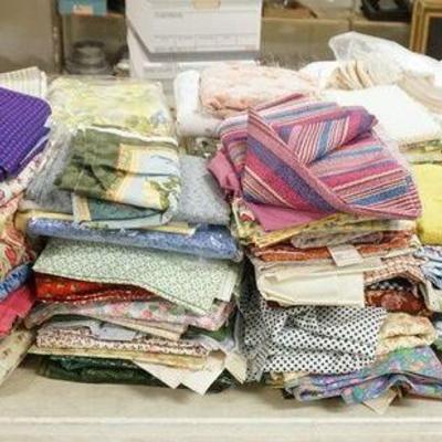 1297	LARGE FABRIC MATERIAL LOT, SOME LARGE QUILTING SQUARES, MOSTLY YARDAGE
