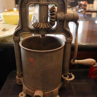 Cast iron sausage stuffer fruit press lard press