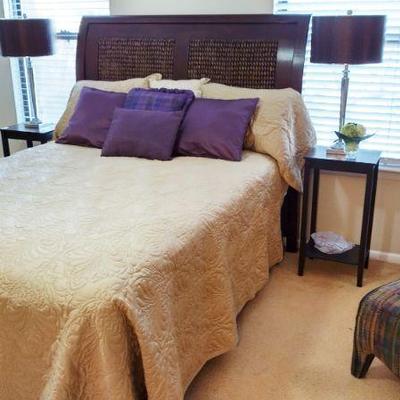 Another shot of the PIER ONE bed with Purple accent pillows and gold coverlet
