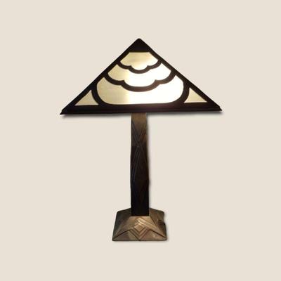 Heavy bronze lamp with frosted shade