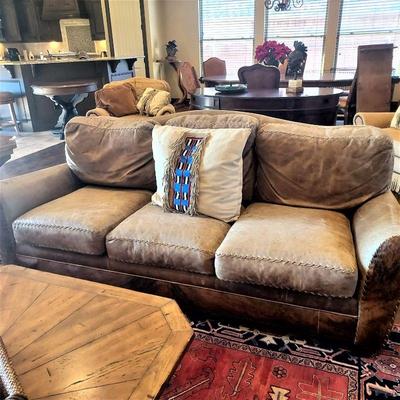 Leather sofa with cowhide back
