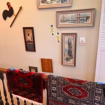 Many pieces of home decor, art and rugs