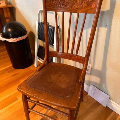 Antique Carved Wood Chair with Decorated Leather Seat