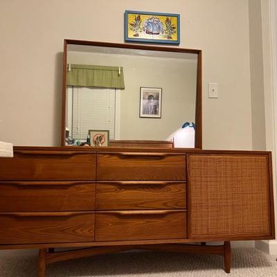 Heywood Wakefield 1960â€™s triple dresser with wood weaved door $850
65â€L x 19â€D x 61â€T (incl. mirror) water spot on top-see other...