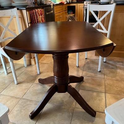 Dropleaf kitchen pedestal table $175