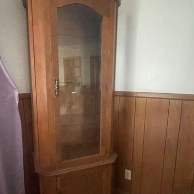 corner cabinet with 3 glass shelves