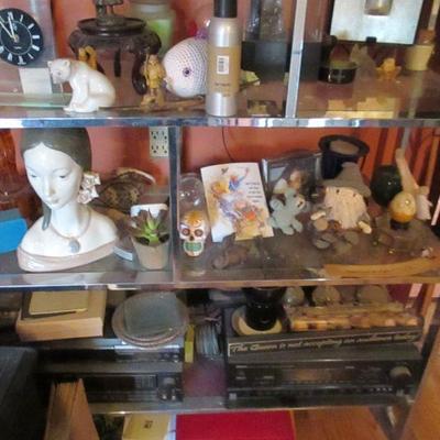 Etagere Filled With Collectibles Lladros and more 