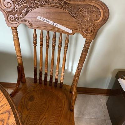 4 pressed back chairs