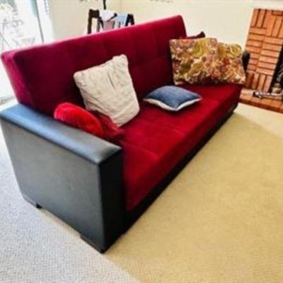 Red microfiber couch,  Pulls out to full size elevated bed.