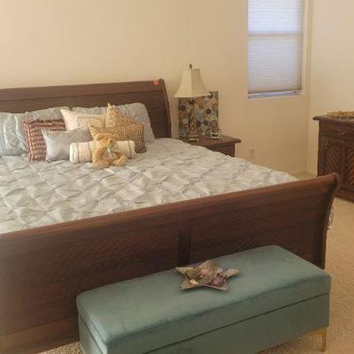 Cal King dark wood sleigh bed with Tempurpedic mattress included.  