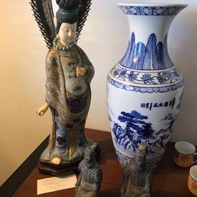 Cloisonne figurine $400
Blue and white vase $95