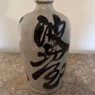 Chinese pottery wine jar with slip decoration
