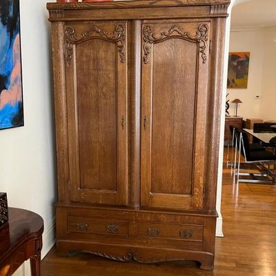 antique American oak armoire with shelves, hanging rail and two drawers, 84