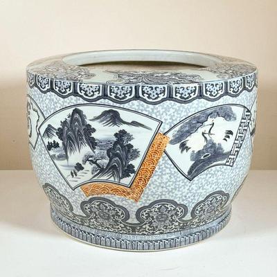 CHINESE CERAMIC PLANTER | Blue and white large Chinese porcelain planter with various scenes in reserves and mountainous motifs with rust...