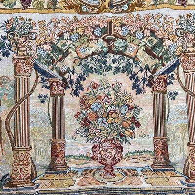 FLORAL ARBOR TAPESTRY | Needlepoint tapestry showing flowers in an urn amongst columns in a landscape - w. 28 x h. 25 in. (approx.) 