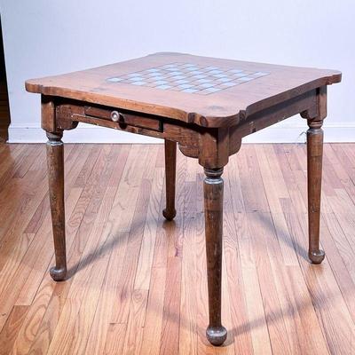 VINTAGE GAME TABLE | Square wood table with scalloped edge top and carved chess board over a single storage drawer and four turned legs -...