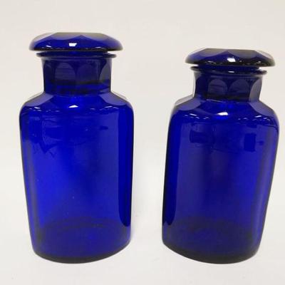 1107	PAIR OF APOTHECARY COBALT BLUE JARS W/GROUND & POLISHED BOTTOMS & GROUND & POLISHED STOPPERS, APPROXIMATELY 9 3/4 IN HIGH

