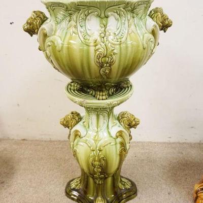 1168	LARGE MAJOLICA POT & PEDESTAL W/EMBOSSED LION HEADS & PAWS, LOSS TO CHIN ON ONE, BOTTOM MARKED 44-15 & 815-15,...