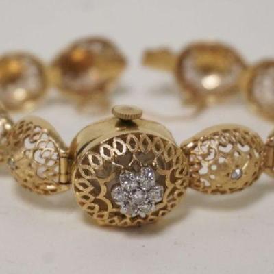 1150	LADY'S GOLD WRISTWACH AXA 17 JEWELS INCABLOC SWISS WATCH CASE MARKED 14KT GOLD, BAND MARKED 14KT GOLD 16.1 DWT

