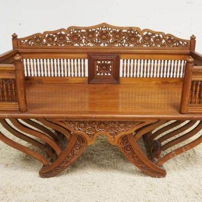 1165	INTRICATELY CARVED AFRICAN MAHOGANY BENCH W/SPINDLE BACK & SIDES, APPROXIMATELY 60 IN X 25 IN X35 IN HIGH
