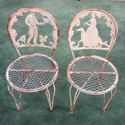 1161	PAIR OF METAL GARDEN CHAIRS W/CAST METAL COURTING SCENES
