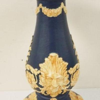 1195	ART POTTERY PEDESTAL WITH EMBOSSED FLOWERS AND FACES, APPROXIMATELY 21 IN H
