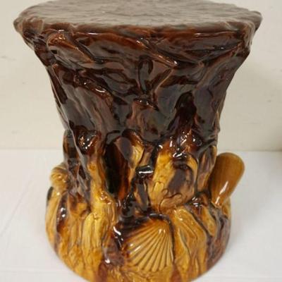1197	POTTERY STAND/PEDESTAL WITH EMBOSSED SEA SHELLS AROUND BASE, MARKED ENGLAND, APPROXIMATELY 11 1/2 IN X 13 1/2 IN H

