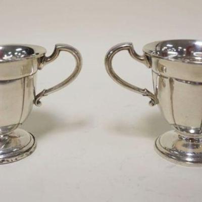1079	STERLING WEIGHTED CREAMER & SUGAR, APPROXIMATELY 3 1/4 IN HIGH
