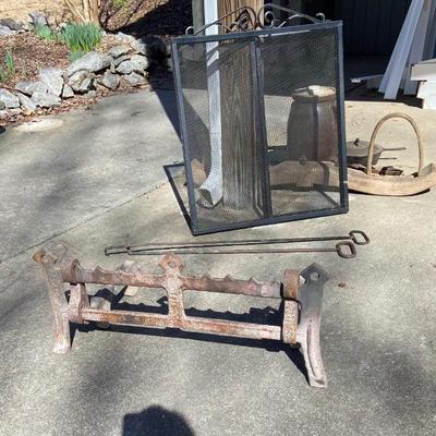 Antique andirons and grate