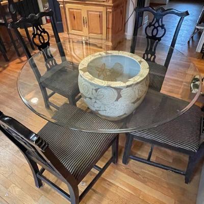 48" round glass top dining table and 4 chairs