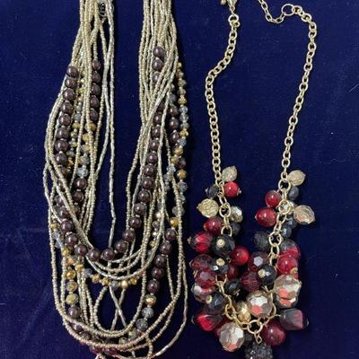 layered beaded necklace and gold tone red multi colored pearl necklace