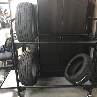 LOT 132 Large Tube 2 Tier Tire Rack &3 New Tires
Tire rack Measures: 72