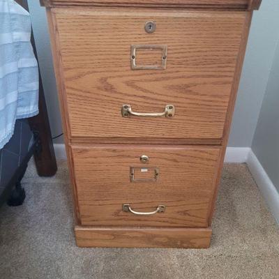 Two drawer, lockable, wood  file cabinet