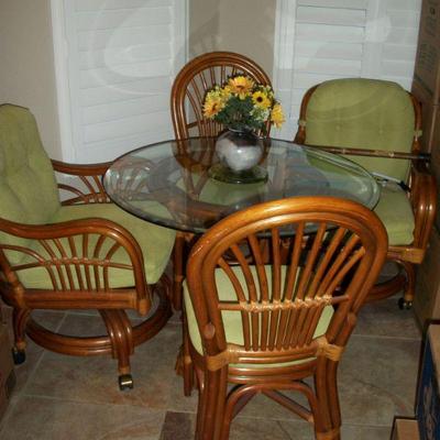 ***BIN*** Islamorada Rattan Indoor Dining Table with 4 Chairs(2 - Casters & 2-Regular), Priced $350.00